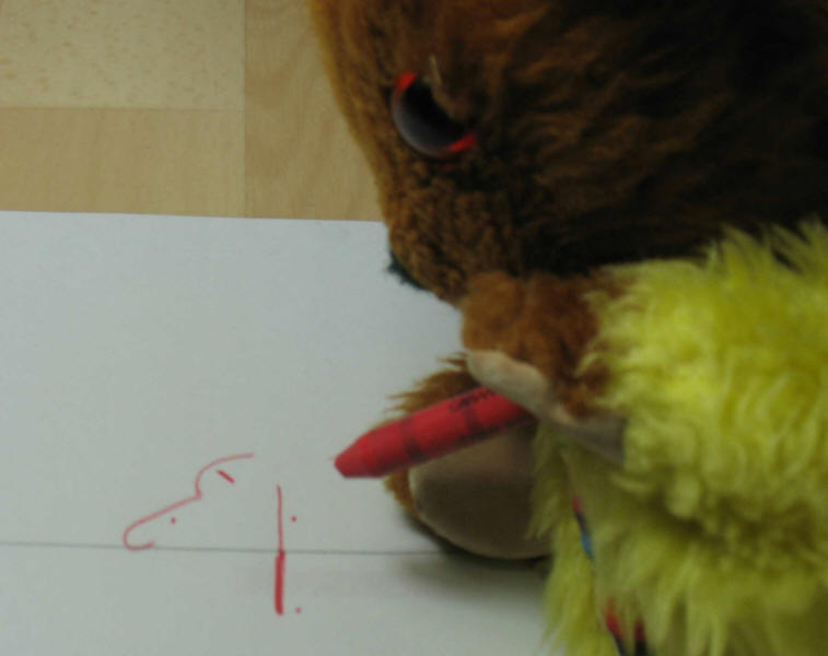 Yellow Teddy writing his name in shorthand