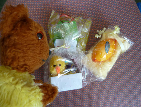 Yellow Teddy with Easter eggs and gifts