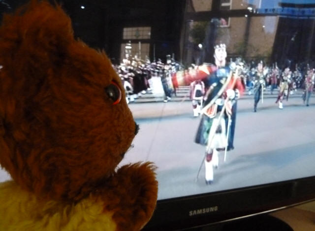 Yellow Teddy watching Edinburgh Military Tattoo