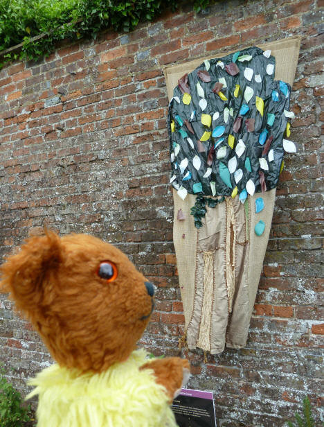 Yellow Teddy with needlework tree hanging