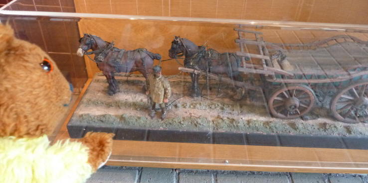 Yellow Teddy with model of horse-drawn farmer's cart