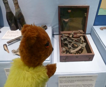 Yellow Teddy with rusty sextant