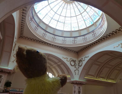 Yellow Teddy admiring the glass domed roof in Kursaal