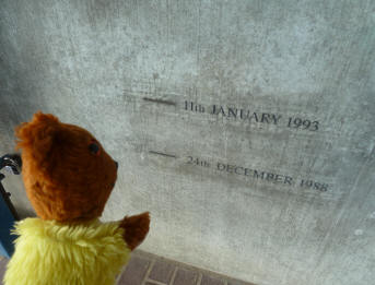 Thames Barrier - Yellow Teddy looking at flood level marks