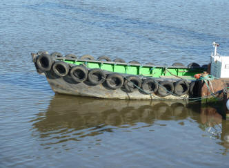 Boat with tyres around