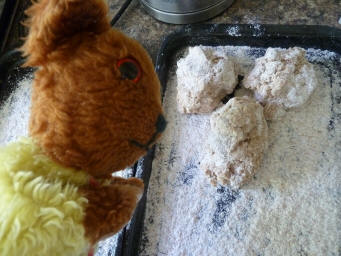 Yellow Teddy with buns on oven tray