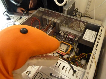 Dino helping repair computer