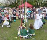 Dancing round maypole