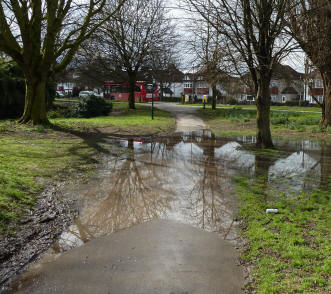 Big puddle over path