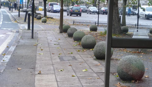 Stone balls near bus stop
