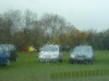 Mizzly boot sale view through car