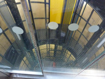 Glass door to foot tunnel elevator