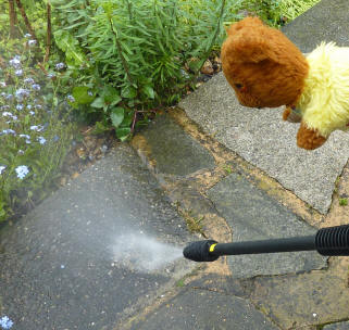 Pressure washer in action