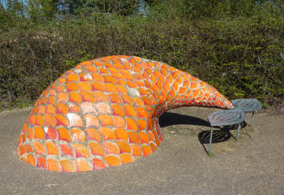 Fishtail sculpture and seat