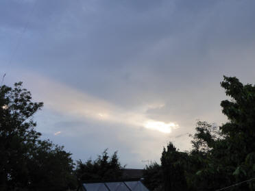 Sunray through storm clouds
