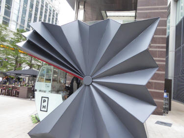 Folding origami kiosk