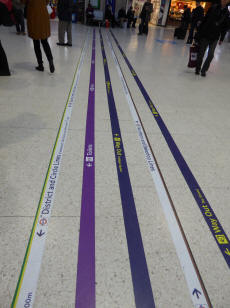 Direction lines on station concourse