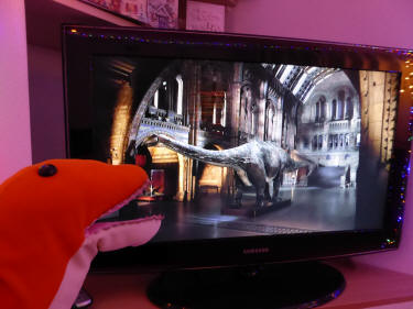 Watching dinosaur on TV