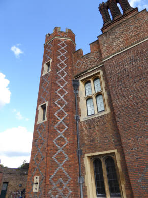 Decorative brickwork pattern on corner tower