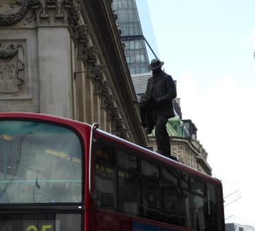 Statue and London bus