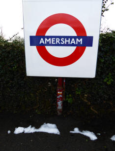 Amersham station sign and snow