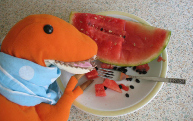 Dino with red melon