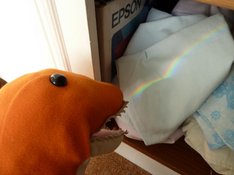 Dino with rainbow